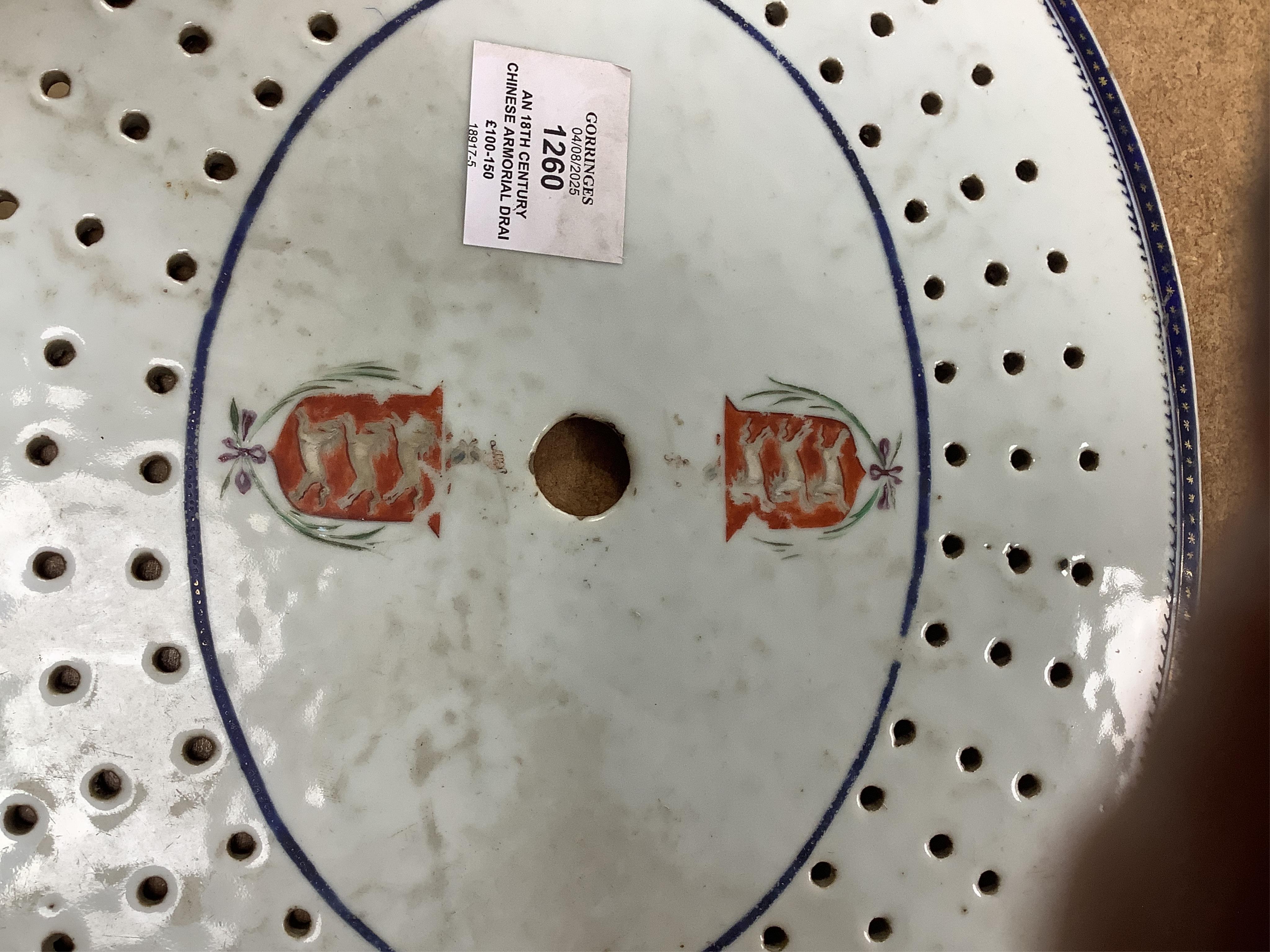 An 18th century Chinese armorial drainer, 18th century, 35cm wide